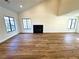 Large living room with hardwood floors, fireplace, and abundant natural light at , Las Vegas, NV 89110