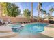 Stunning pool and spa with ample seating and landscaping at 11009 Pentland Downs St, Las Vegas, NV 89141