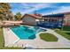 Inviting swimming pool with a spa and covered patio area at 1408 Dolomiti Dr, Las Vegas, NV 89117