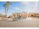 Single-story house with desert landscaping and two-car garage at 2652 Youngdale Dr, Las Vegas, NV 89134