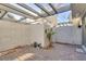 Small, private patio area with plants at 5548 Orchard Ln, Las Vegas, NV 89110