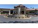 Community center with a circular driveway and stonework at 7327 Mission Hills Dr # 0, Las Vegas, NV 89113