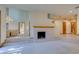 Bright and airy living room featuring a fireplace and high ceilings at 7327 Mission Hills Dr # 0, Las Vegas, NV 89113