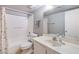 Bathroom with tub shower combination and updated vanity at 7905 Esterbrook Way # 101, Las Vegas, NV 89128