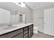 Bathroom with double vanity and tiled floors at 10223 Aragon Crown Rd, Las Vegas, NV 89135