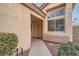 Front entry with a walkway and neutral-colored door at 1115 Scenic Crest Dr, Henderson, NV 89052