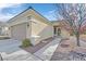 Single-story home with attached garage and landscaped front yard at 2537 Libretto Ave, Henderson, NV 89052