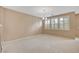 Bright dining area with tile floors and chandelier at 319 Fox Lake Ave, Las Vegas, NV 89148