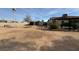 Large backyard with storage shed and trees at 4143 Laurel Park Ave, Las Vegas, NV 89103