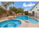 Large pool and spa with rock features at 4332 Val Dechiana Ave, Las Vegas, NV 89141