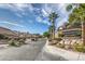 Monument community entrance with palm trees and a gated entryway at 4623 Harvest Night St, Las Vegas, NV 89129