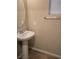 Simple bathroom with pedestal sink and mirror at 8036 Sundance Valley Dr, Las Vegas, NV 89178