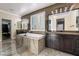 Luxurious bathroom featuring a large soaking tub and double vanity at 8801 Crescent Lake St, Las Vegas, NV 89113