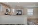 Modern kitchen with gray cabinets and island at 10079 Dazzling Sunrays Ave # 0, Las Vegas, NV 89129