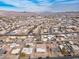 Wide aerial view of a residential neighborhood with a single-story house at 266 Tungsten St, Henderson, NV 89015