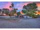 Spacious backyard with pool, and a stunning sunset view at 2677 S Torrey Pines Dr, Las Vegas, NV 89146