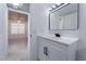 Modern bathroom with white vanity and rectangular mirror at 4036 Pelham Ct, Las Vegas, NV 89110