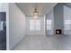 Bright dining area with fireplace and tile flooring at 4036 Pelham Ct, Las Vegas, NV 89110