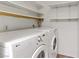 Laundry room with LG washer and dryer and extra shelving at 4373 Spencer St, Las Vegas, NV 89119