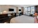 Spacious bedroom with a desk and city views at 4381 W Flamingo Rd # 2202, Las Vegas, NV 89103