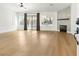 Bright and airy living room with hardwood floors and a fireplace at 6065 Shadow Oak Dr, North Las Vegas, NV 89031