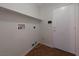 Laundry room with built-in shelving and tile floor at 6118 Evening View St, North Las Vegas, NV 89031