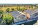 Aerial view of two-story townhouses and green space at 6624 Lavender Lilly Ln # 1, North Las Vegas, NV 89084