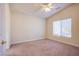 Bright bedroom with ceiling fan and window blinds at 6624 Lavender Lilly Ln # 1, North Las Vegas, NV 89084