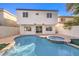 Stunning pool and spa area with a view of the home's exterior at 686 Ribbon Grass Ave, Las Vegas, NV 89183