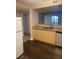 Kitchen with ample cabinet space and dark flooring at 8000 W Badura Ave # 2092, Las Vegas, NV 89113