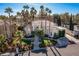 Stunning aerial view of a luxurious home with lush landscaping at 8109 Moonstone Cir, Las Vegas, NV 89128