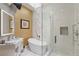 Spa-like bathroom with a soaking tub, walk-in shower, and marble accents at 8109 Moonstone Cir, Las Vegas, NV 89128