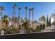 Stunning two-story home with manicured landscaping and palm trees at 8109 Moonstone Cir, Las Vegas, NV 89128