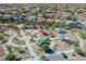 Aerial view of a community park with playground and sitting areas at 1145 Brent Park Ct, Henderson, NV 89002