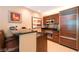 Modern kitchen with stainless steel appliances and wood cabinets at 125 E Harmon Ave # 2514, Las Vegas, NV 89109