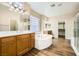 Large bathroom with soaking tub and double vanity at 1582 Shady Elm St, Las Vegas, NV 89135