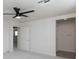 Bedroom with ceiling fan and access to hallway and bathroom at 2179 Tortona St, Henderson, NV 89044