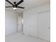 Spacious bedroom with double door closet and ceiling fan at 2179 Tortona St, Henderson, NV 89044