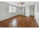 Bright living room with hardwood floors and neutral walls at 5647 Deer Run Ct, North Las Vegas, NV 89031