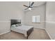 Bedroom with a full-size bed and ceiling fan at 6125 Resort Ridge St, Las Vegas, NV 89130