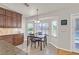 Bright breakfast nook with window seating and view of the backyard at 6125 Resort Ridge St, Las Vegas, NV 89130