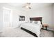 Spacious bedroom with king-size bed and large window at 6865 Hidden Sunset Ln, Las Vegas, NV 89120