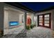 Stunning entryway with fireplace and red phone booth at 6865 Hidden Sunset Ln, Las Vegas, NV 89120