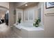 Spa-like bathroom with soaking tub and separate shower at 755 Maranello St, Henderson, NV 89052