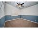 Bright bedroom with ceiling fan, neutral walls, and carpet at 755 Maranello St, Henderson, NV 89052