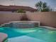 Sparkling pool and spa with tiled accents at 755 Maranello St, Henderson, NV 89052