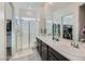 Elegant bathroom with double vanity, large shower, and modern fixtures at 763 Willow Oasis St, Henderson, NV 89011