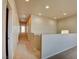 Upstairs hallway with carpet and neutral walls at 9209 Palmer House Ave, Las Vegas, NV 89149