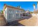 Sunroom and spacious backyard with block wall and patio at 1950 Turtlerock St, Las Vegas, NV 89142