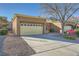 Front view of home with two-car garage and landscaping at 2535 Sierra Sage St, Las Vegas, NV 89134